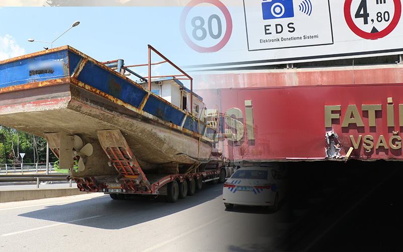 Tırda taşınan balıkçı teknesi alt geçide takıldı, trafik altüst oldu